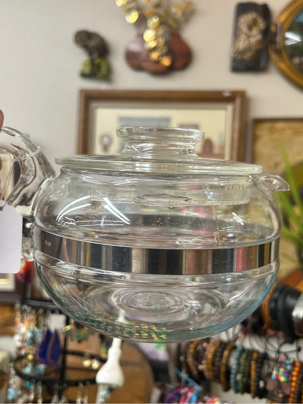 vintage Pyrex Flameware teapot, stovetop use and has a 6-cup capacity